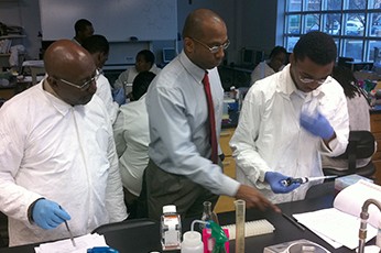 men in a lab working dr. butscher