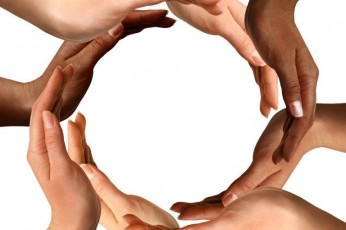 image of hands in a circle